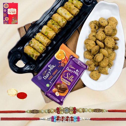 Gourmet Roll Baklawa n Dairy Milk with Fancy Rakhi Duo to World-wide-rakhi-sweets.asp