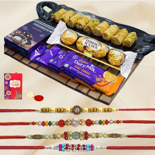 Designer Rakhi Set with Diva Roll Baklawa n Choco Feast to World-wide-rakhi-sweets.asp