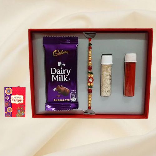 Designer Stone Rakhi with Cadbury Dairy Milk Chocolate to Rakhi-to-world-wide.asp