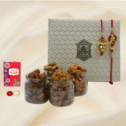 Lovely Bhaiya Bhabhi Rakhi Set with Flavored Cashews to Rakhi-to-world-wide.asp