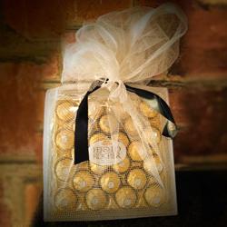 Indulgent Net Wrapped Ferrero Rocher Gift Pack to Rakhi-to-world-wide.asp