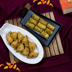 Lovely Combo of Dunkel Braun Roll Baklava n Haldiram Mini Samosa to Rakhi-to-world-wide.asp