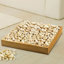 Enticing Cashews in Wooden Tray to World-wide-gifts-for-sister.asp
