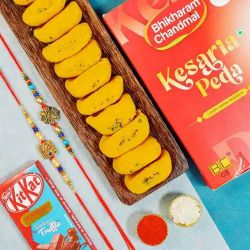 Blazing Kundan Rakhi with Desserts to Rakhi-to-world-wide.asp