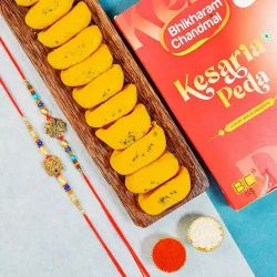 Dual Kundan Rakhi N Peda Moments to World-wide-rakhi-sweets.asp