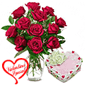 12 Red Roses in vase and A Fresh Baked Heart Shaped Cake 1 Lb and a Cadburys Chocolate. 